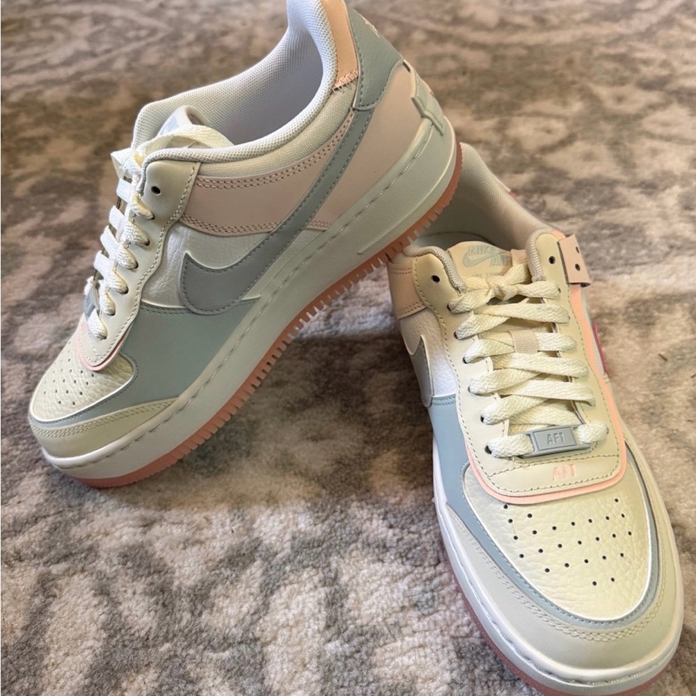 Nike Women’s Low Top Sneakers in Cream, Pale Blue & Light Pink